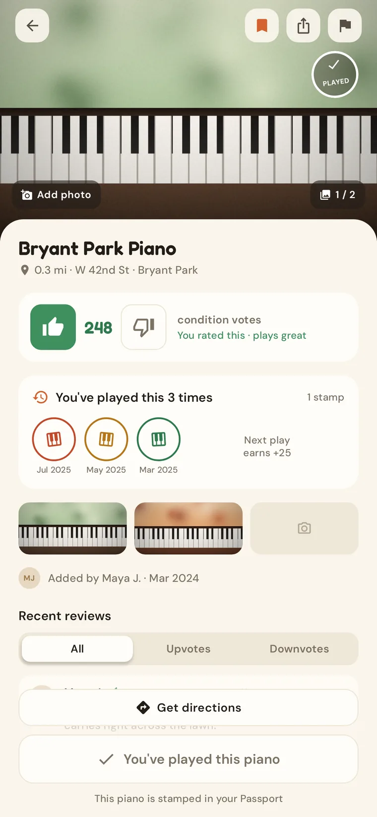 A piano's page with its photo, a Played badge and 248 upvotes